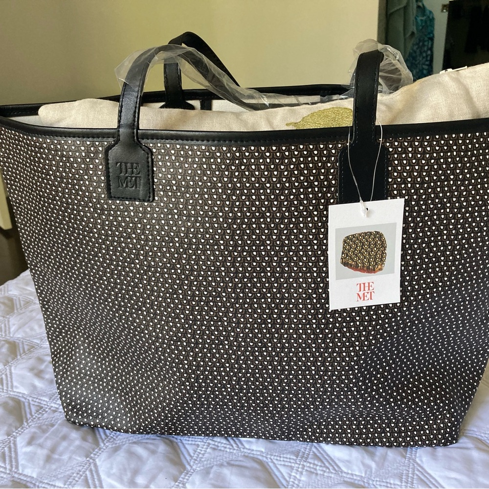 The Met canvas coated bag with leather trim.   NWT